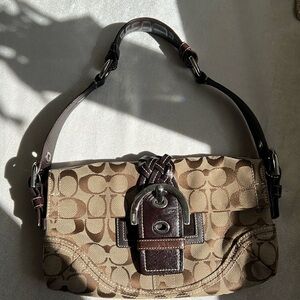 Coach shoulder bag in signature C brown leather trim. Excellent used like new!
